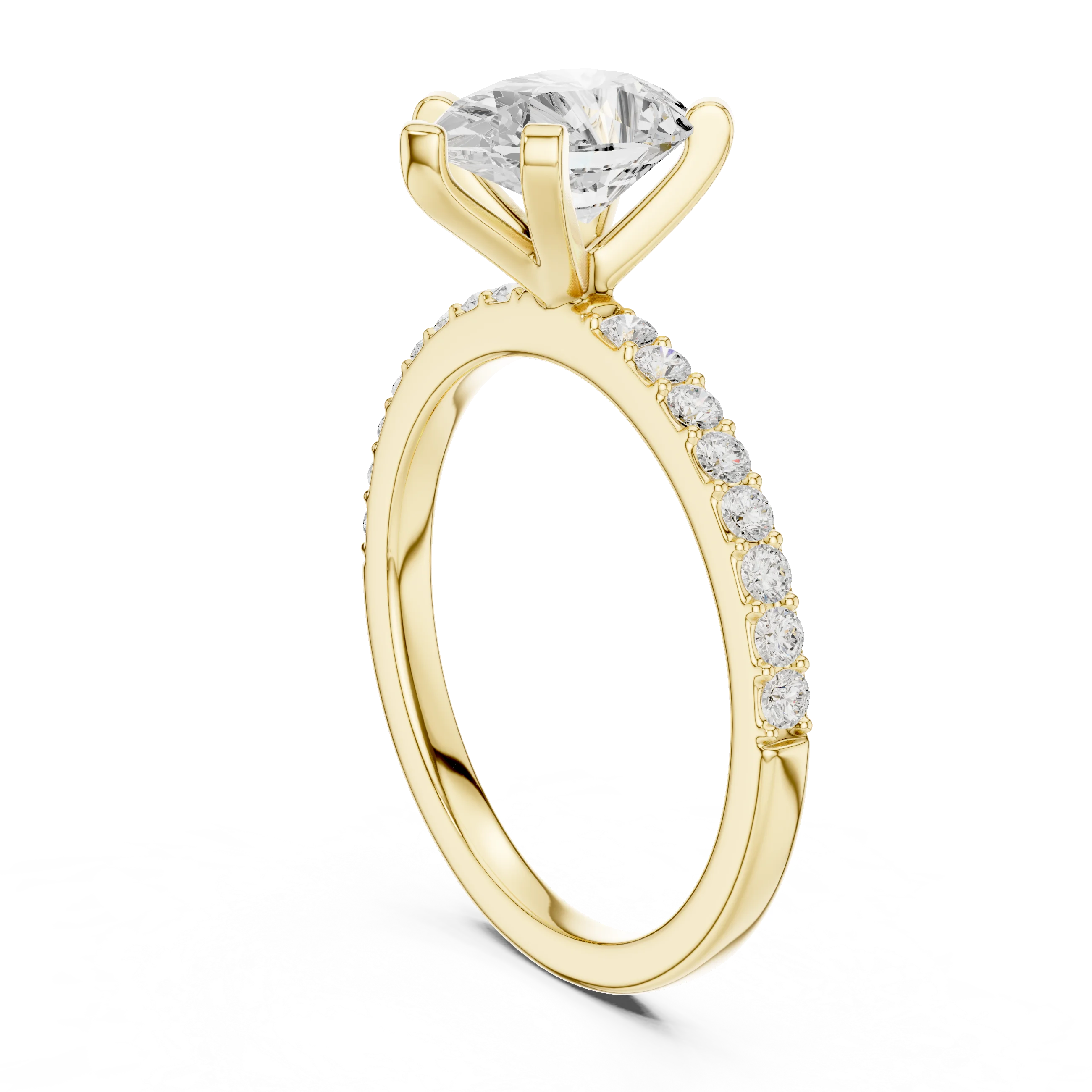 Back side view of yellow gold pear solitaire ring showing thin pavé band and setting details