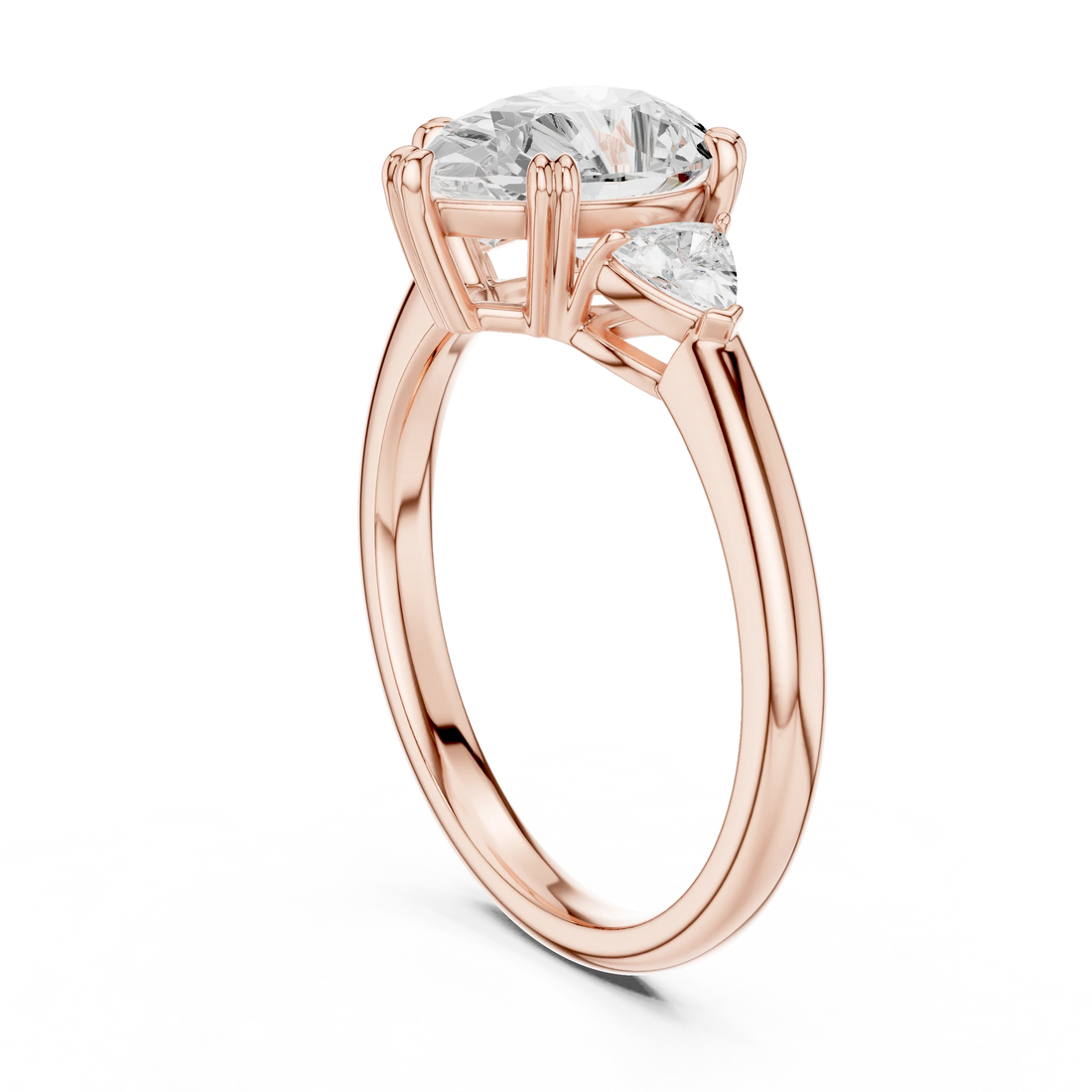 Back view of rose gold pear three-stone ring with half-moon side stones and lab-grown diamond – Australia