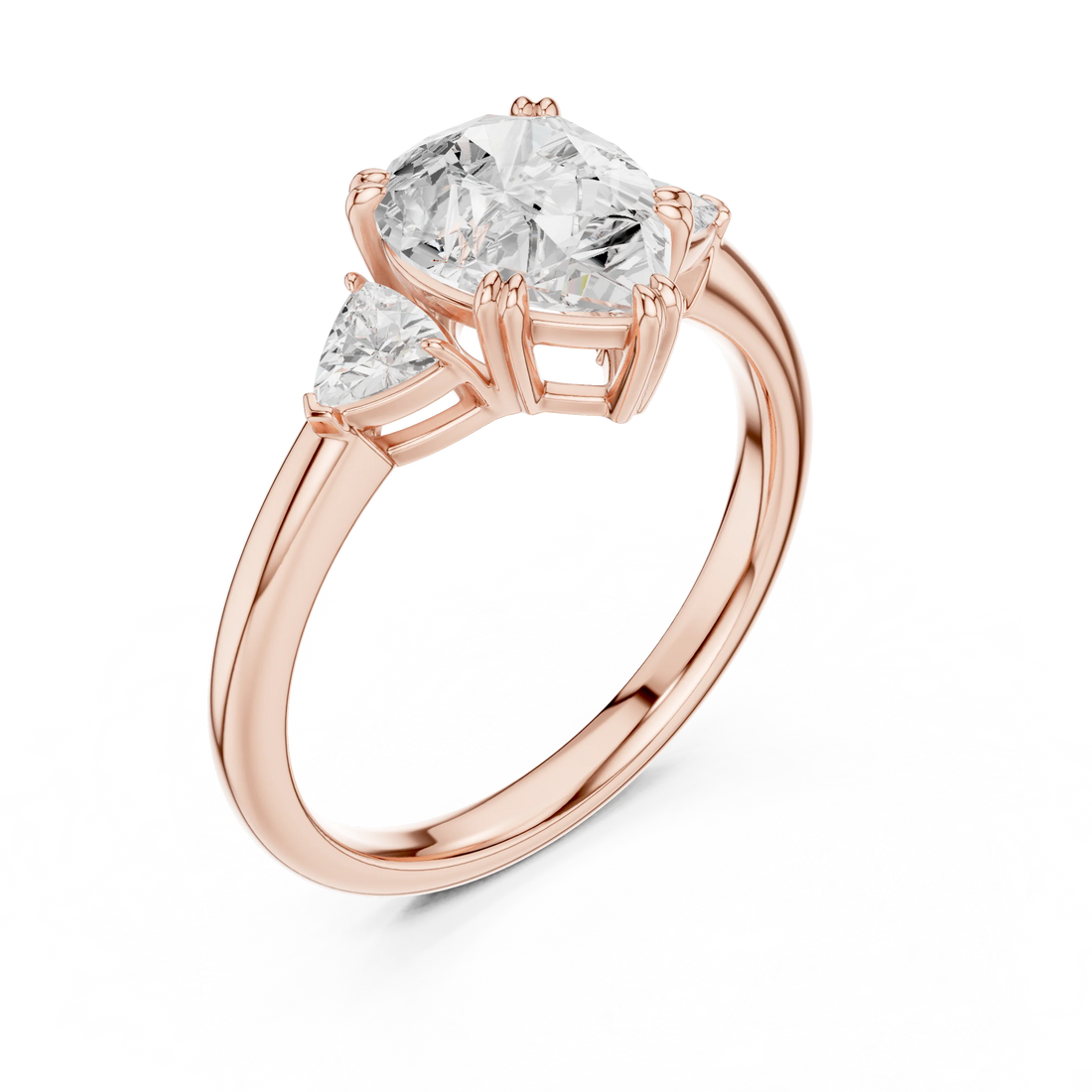 Front view of rose gold pear three-stone ring with half-moon side stones and lab-grown diamond – Australia