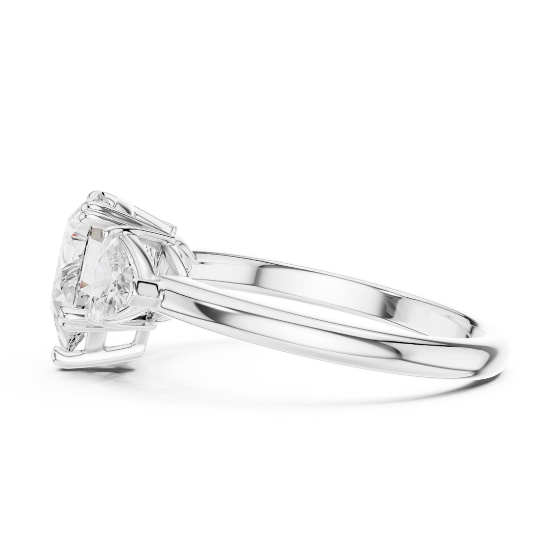 Side view of white gold pear three-stone ring with trillion cut side stones and lab-grown diamond – Australia
