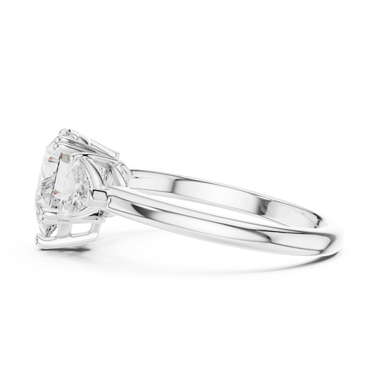 Side view of white gold pear three-stone ring with trillion cut side stones and lab-grown diamond – Australia