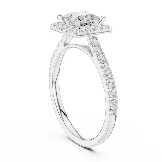Top view of white gold princess-cut halo ring with pavé diamond band and lab-grown center stone