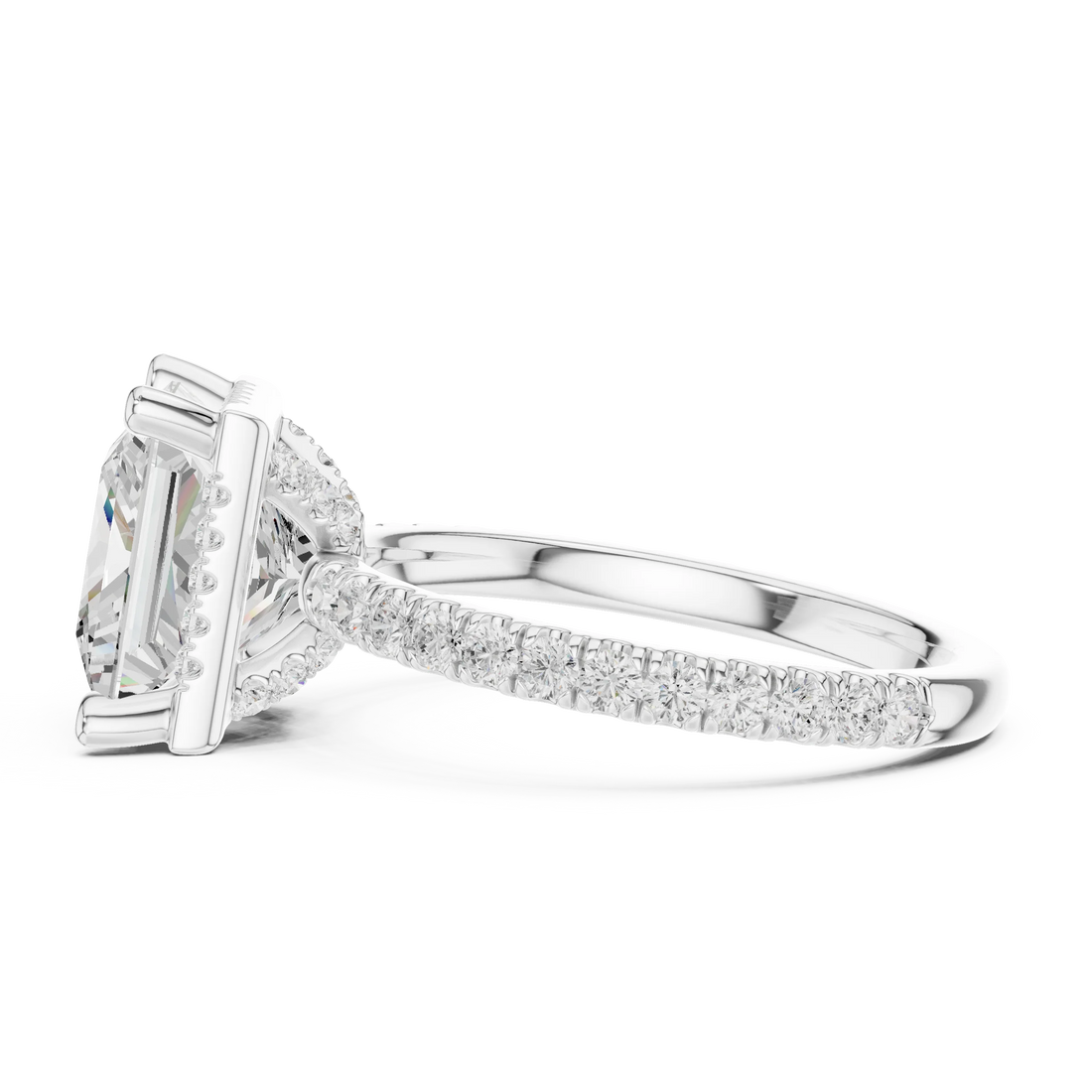 Side view of white gold princess cut micro halo ring highlighting pavé diamond band and halo profile