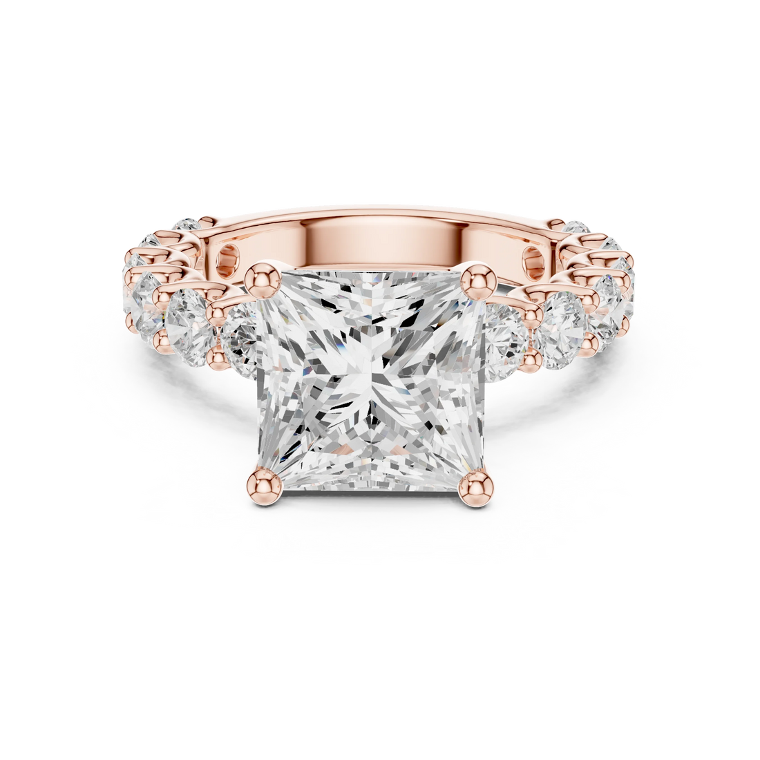 Lab-grown princess cut solitaire ring in rose gold with shared prong large stone band
