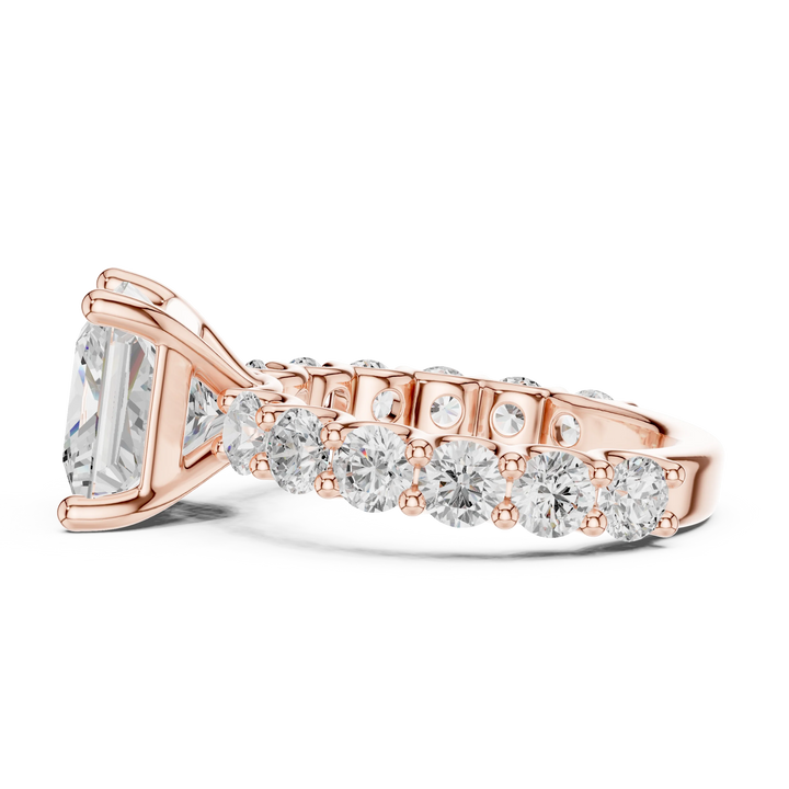 Side profile of rose gold princess cut solitaire ring with shared prong large stone band and elevated center stone