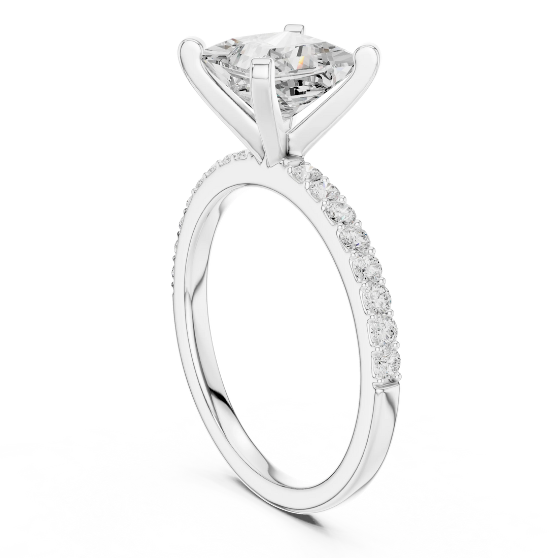 Back side view of white gold princess solitaire ring showing thin pavé band and setting details