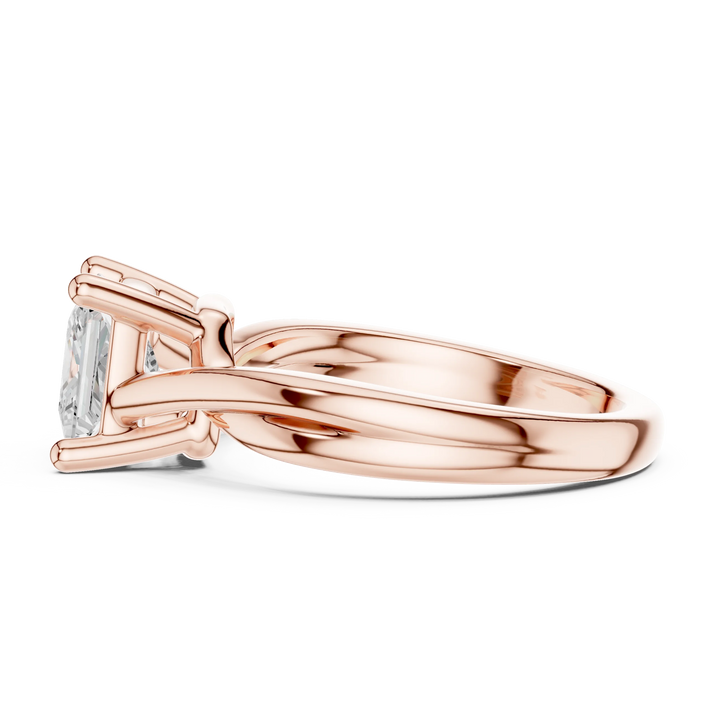Side profile of rose gold princess cut solitaire ring with twisted band and elevated center stone