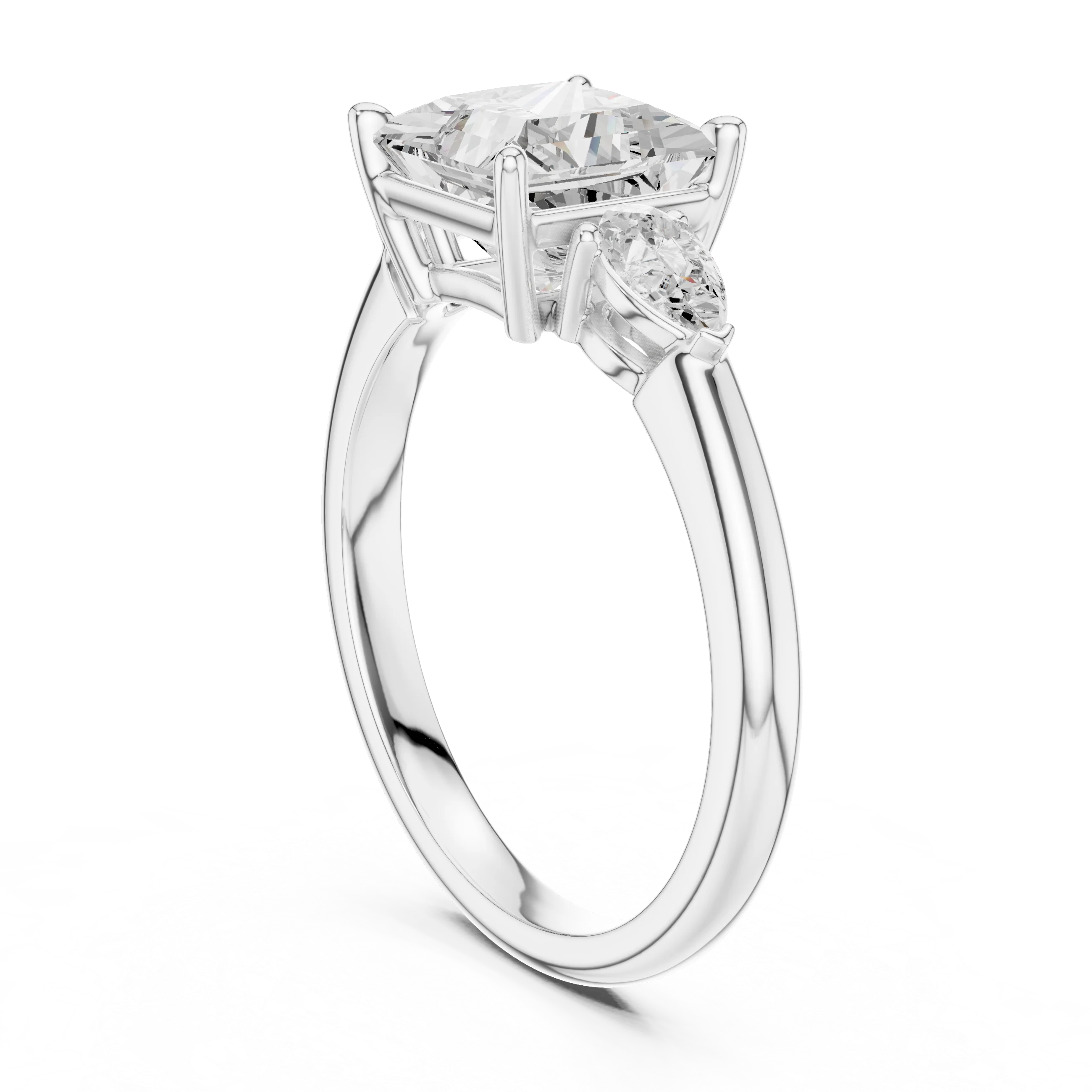 Back side view of white gold princess three-stone ring with pear side stones and lab-grown diamond – Australia