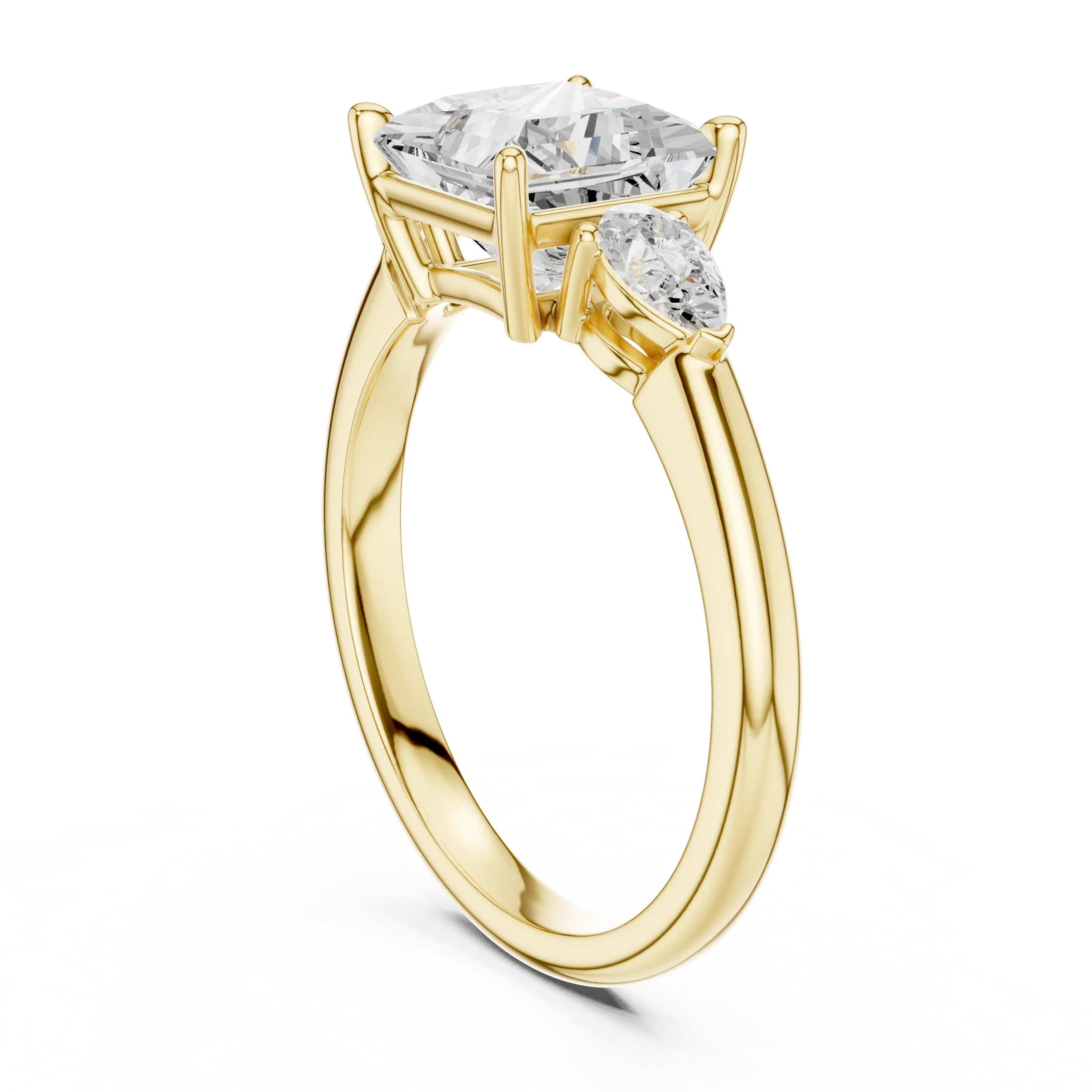 Back side view of yellow gold princess three-stone ring with pear side stones and lab-grown diamond – Australia