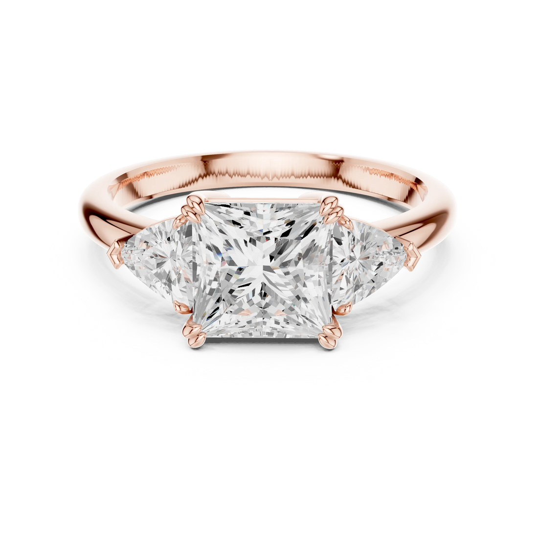 Princess three-stone ring in rose gold with trillion cut side stones and lab-grown diamond – Australia