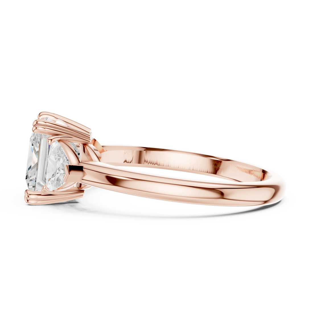 Side view of rose gold princess three-stone ring with trillion cut side stones and lab-grown diamond – Australia