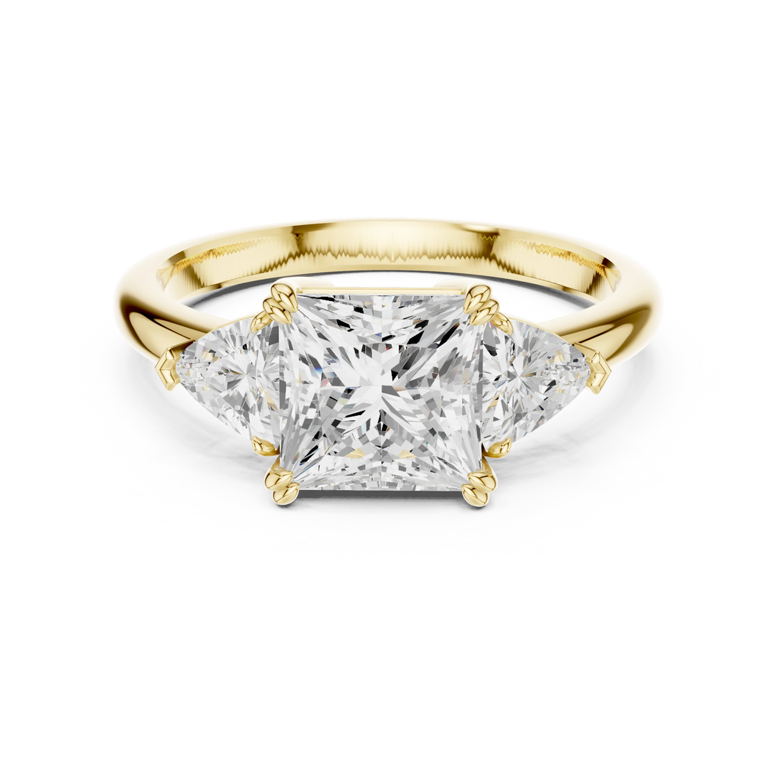 Princess three-stone ring in yellow gold with trillion cut side stones and lab-grown diamond – Australia