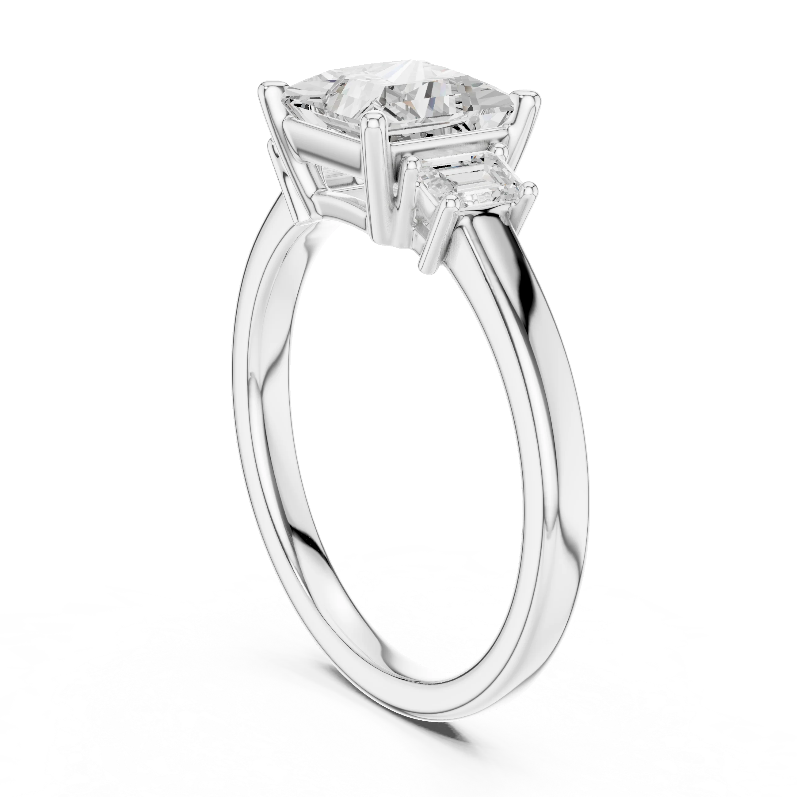 Back side view of white gold princess three stone diamond ring, showing band and setting.