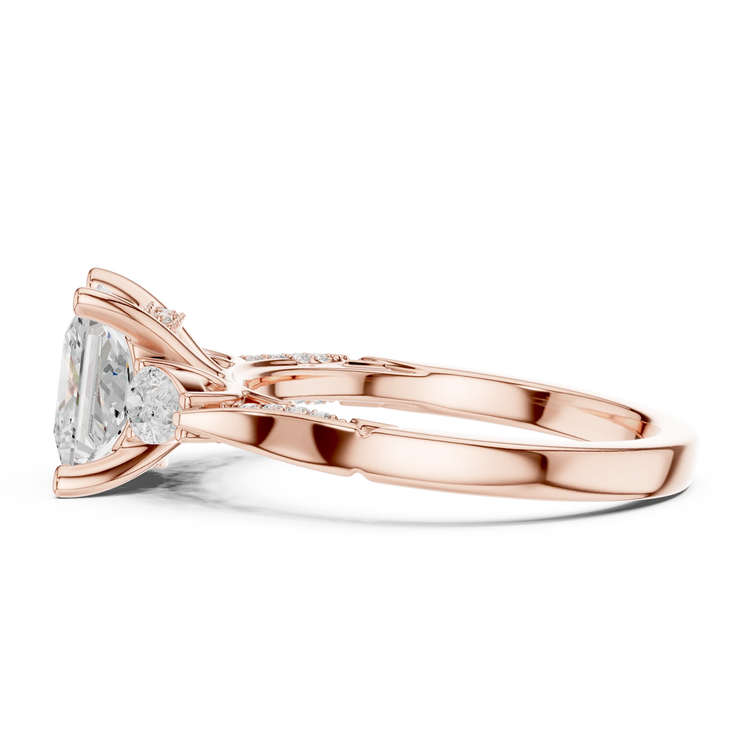 Side view of rose gold princess three stone ring with pear side stones, pave accents and lab-grown diamonds – Australia