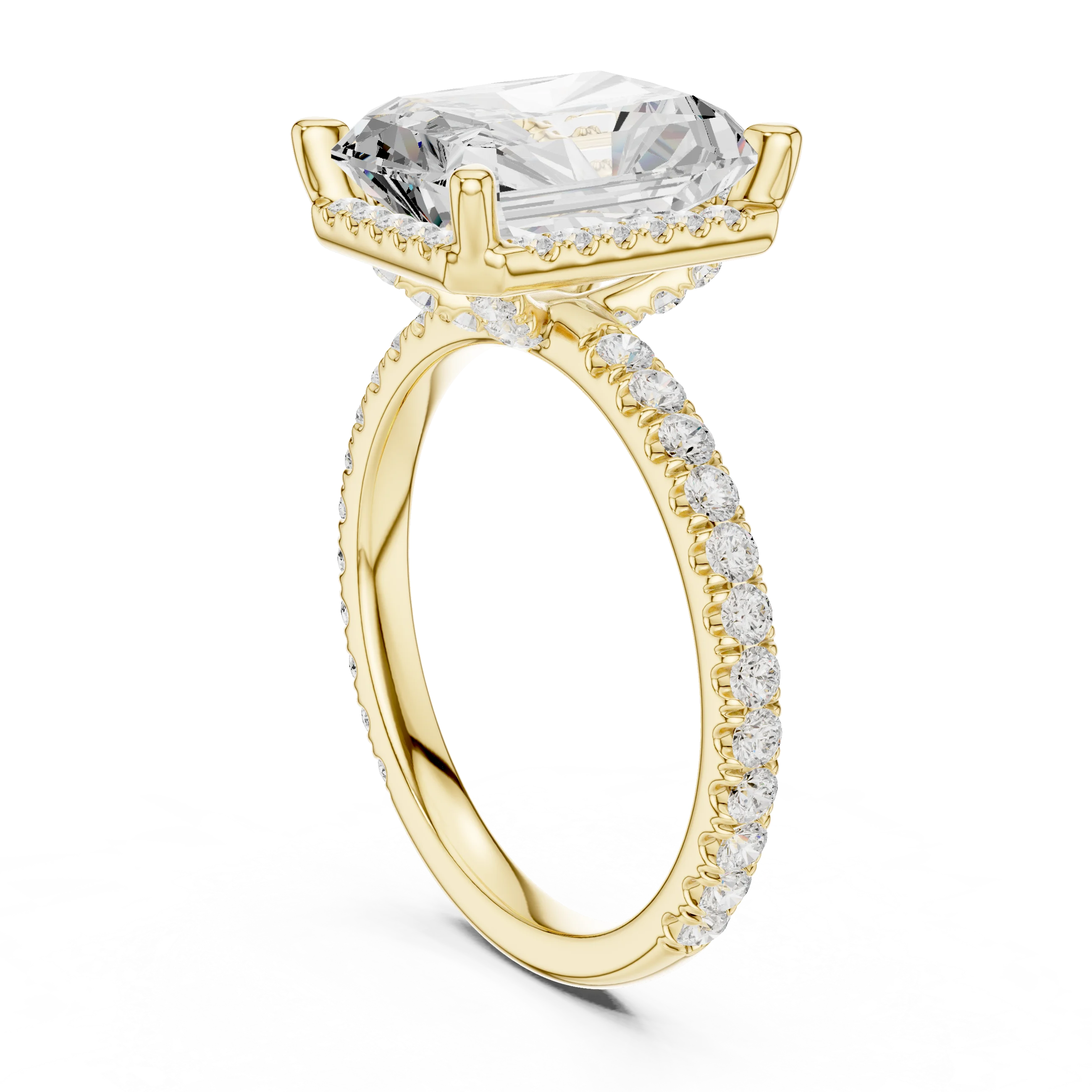 Back view of yellow gold radiant cut micro halo ring showing pavé diamond band and halo setting details