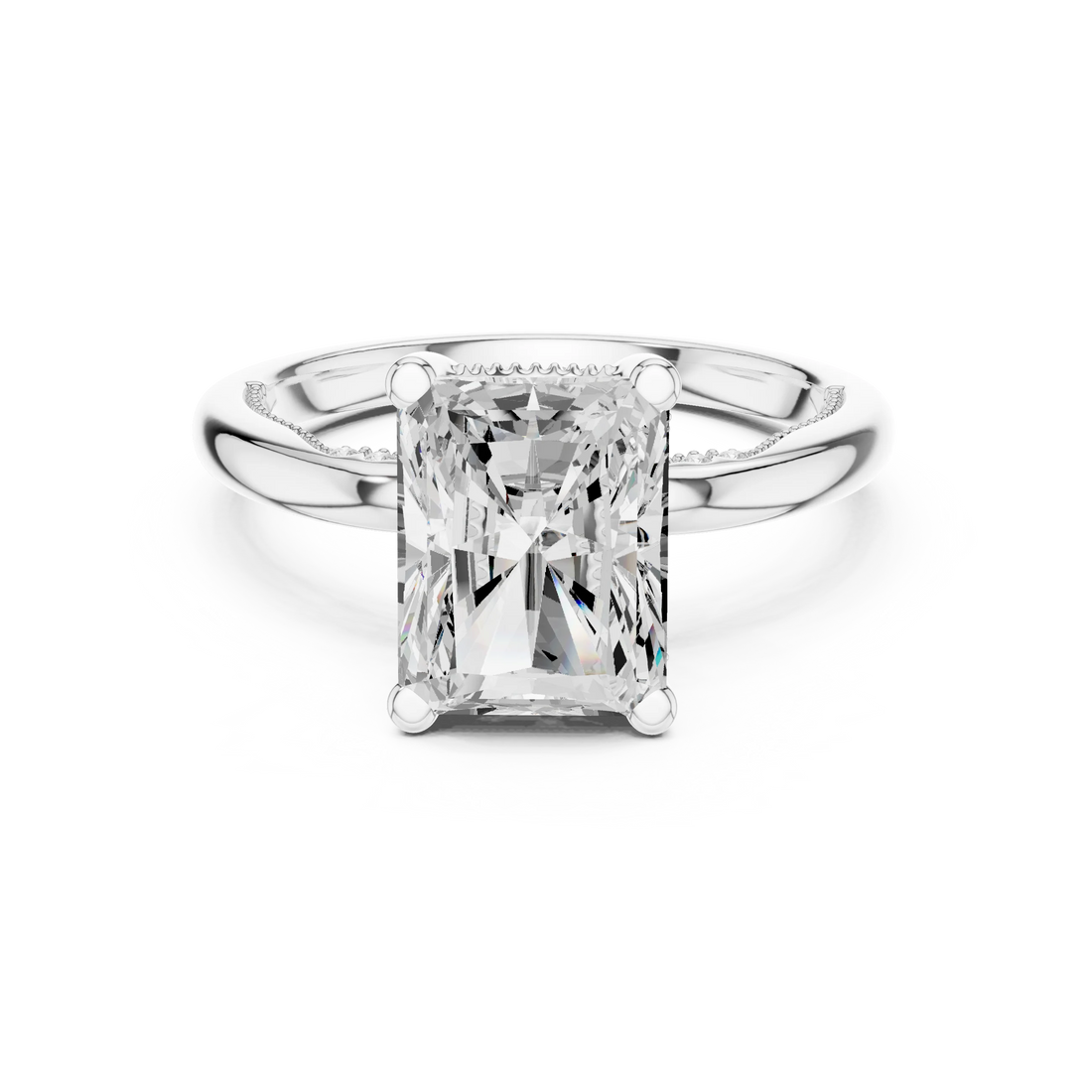 White gold radiant cut solitaire ring with hidden halo and domed band featuring lab-grown diamond, elegant design