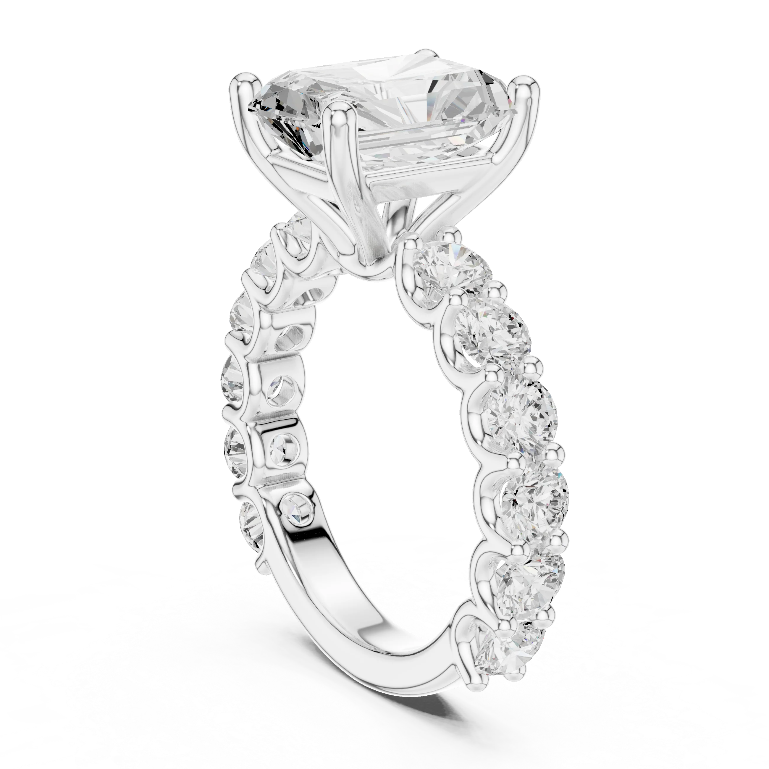 Side view of white gold radiant cut solitaire ring with shared prong large stone band and elevated setting