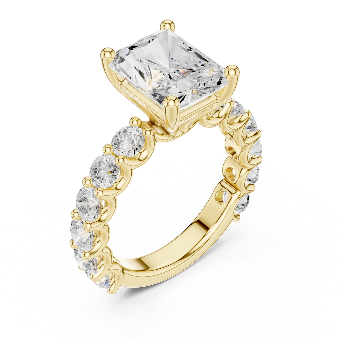 Back side view of yellow gold radiant cut solitaire ring with shared prong large stone band showing setting structure