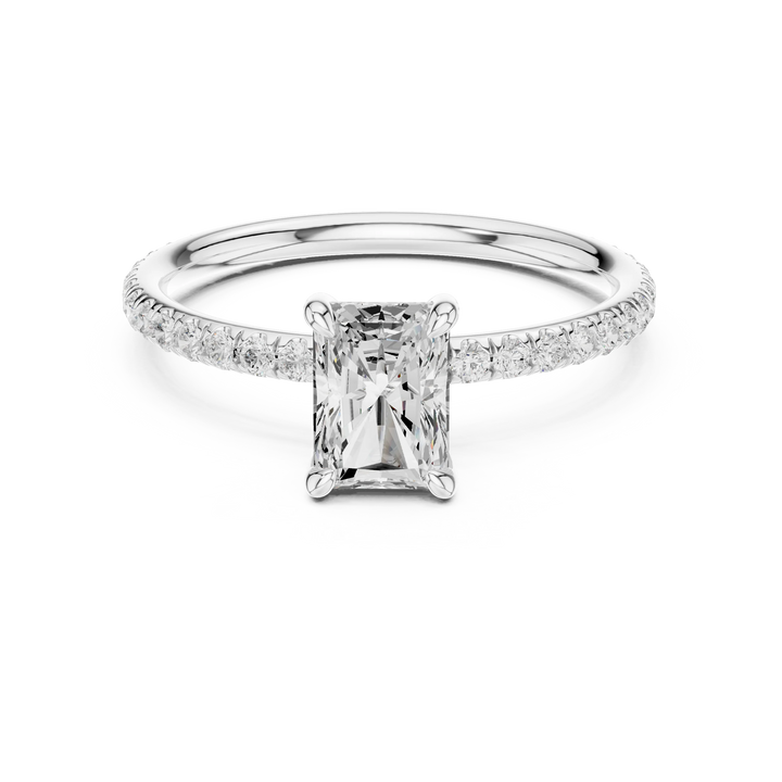 Lab-grown radiant cut solitaire ring in white gold with thin pavé diamond band
