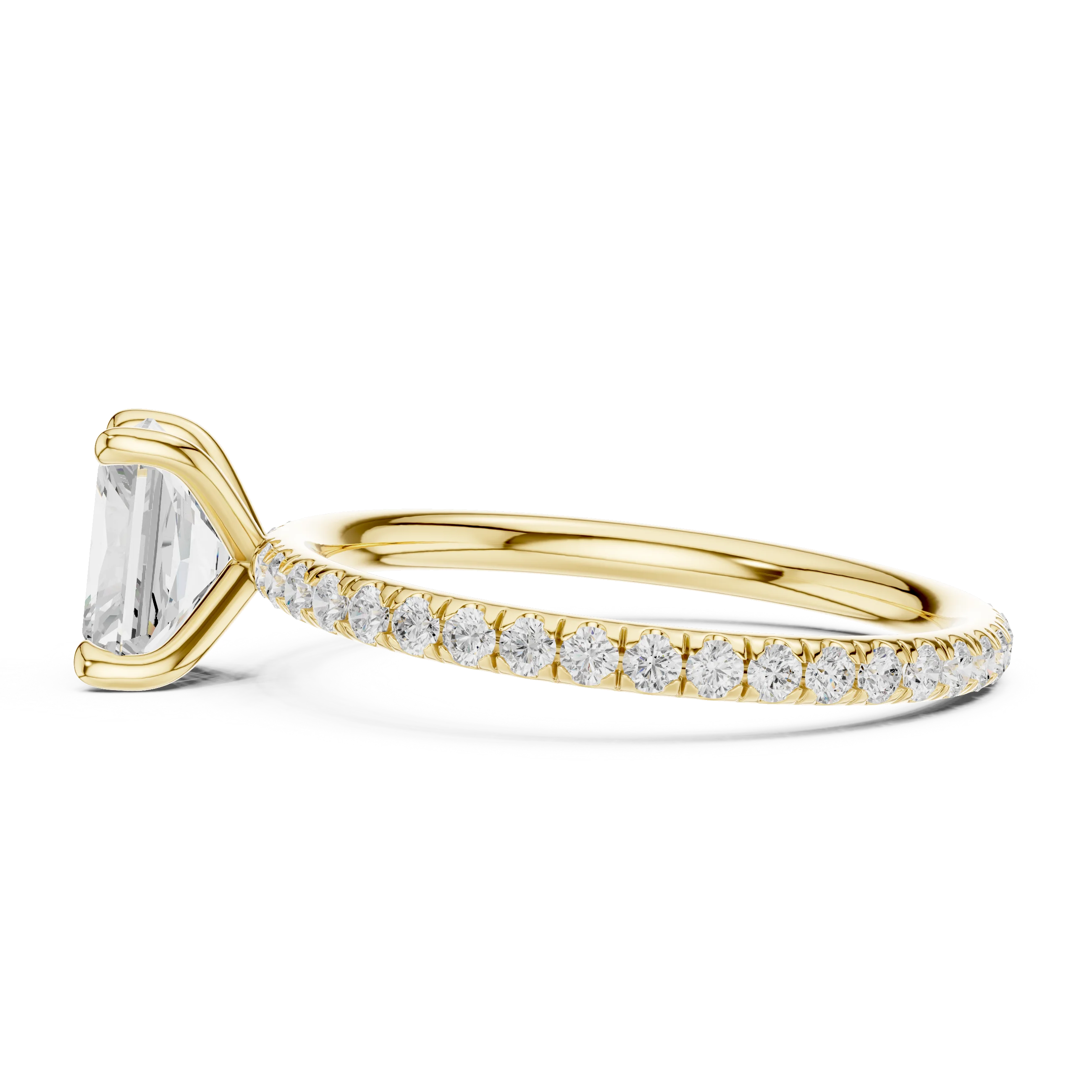 Side view of yellow gold radiant cut solitaire ring with thin pavé diamond band and prong setting
