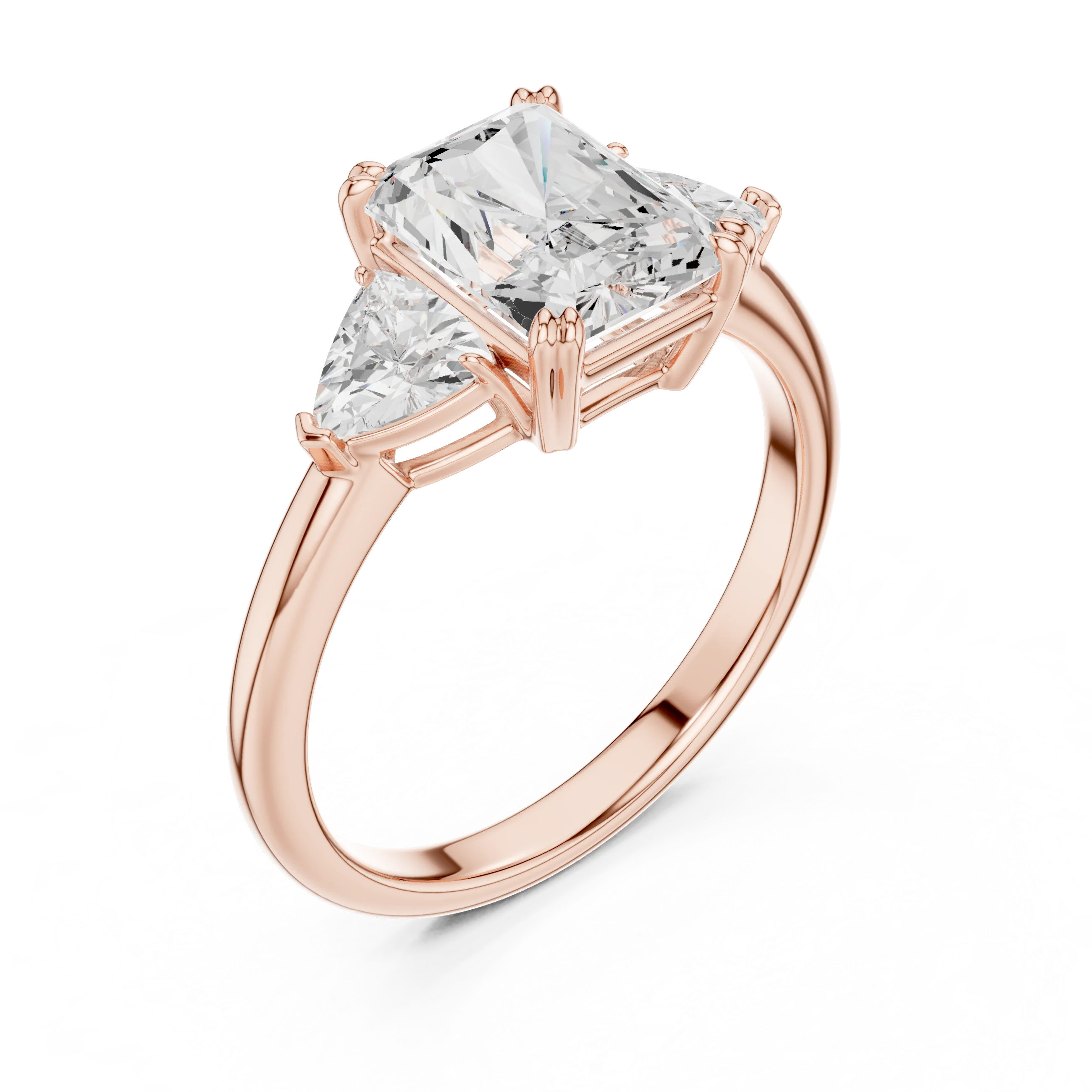 Front view of rose gold radiant three-stone ring with trillion cut side stones and lab-grown diamond – Australia