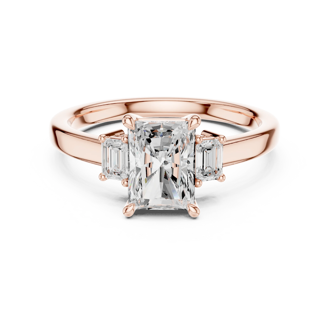 Radiant three stone engagement ring with emerald cut side stones in rose gold, lab grown diamond, Australia DFE