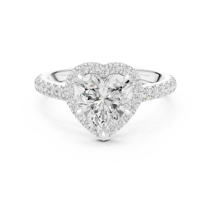 Front view of white gold romantic halo heart shaped diamond ring with lab-grown center stone surrounded by halo diamonds, elegant love-inspired design