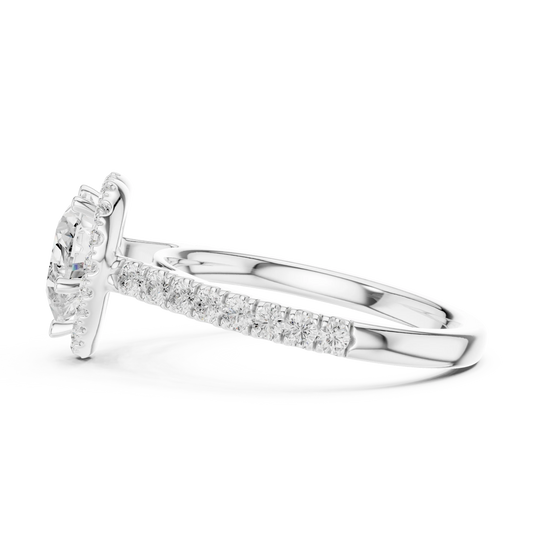 Side view of white gold heart shaped diamond ring with romantic halo setting showing elevated center stone and refined band profile