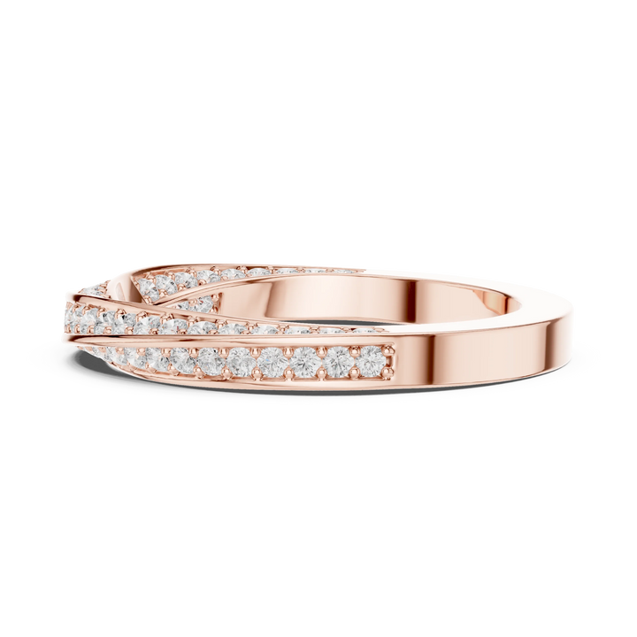 Side view of rose gold eternity band highlighting crossover twist pattern and pavé diamond setting