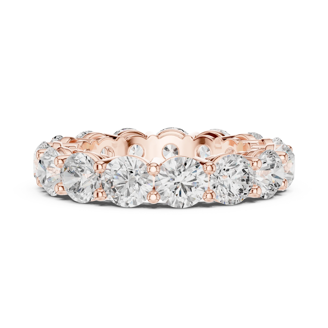 Side view of rose gold eternity band highlighting round diamond setting and band profile
