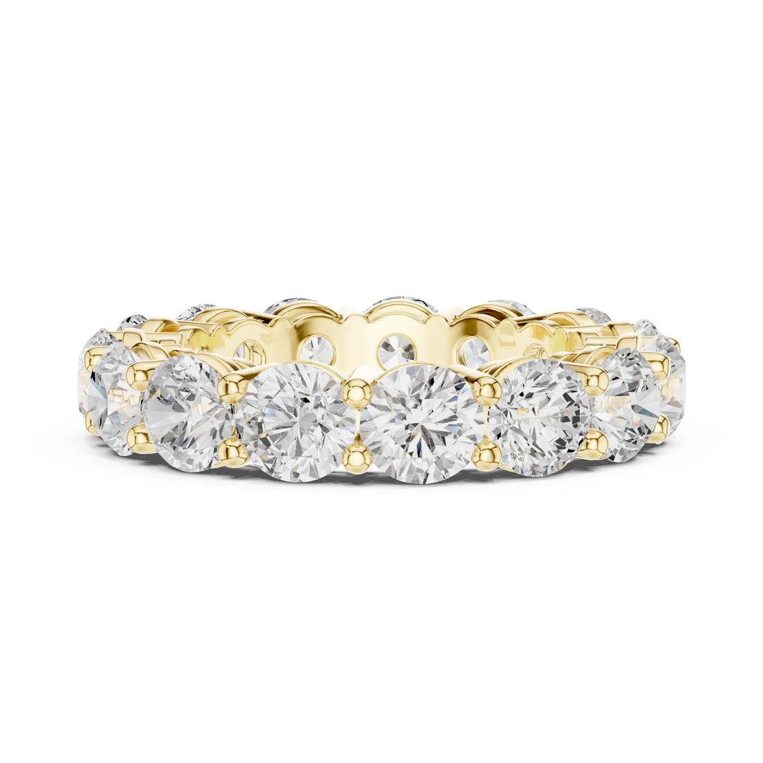 Side profile of yellow gold eternity band highlighting round diamond setting