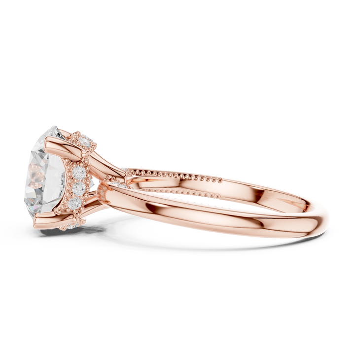 Side view of rose gold round cut solitaire ring highlighting hidden halo and domed band design