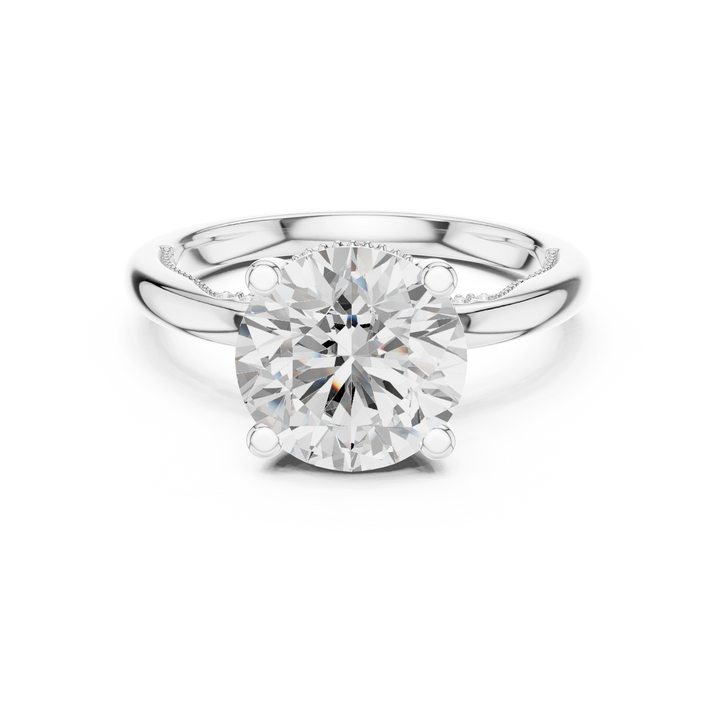 White gold round cut solitaire ring with hidden halo and domed band featuring lab-grown diamond, classic elegant design