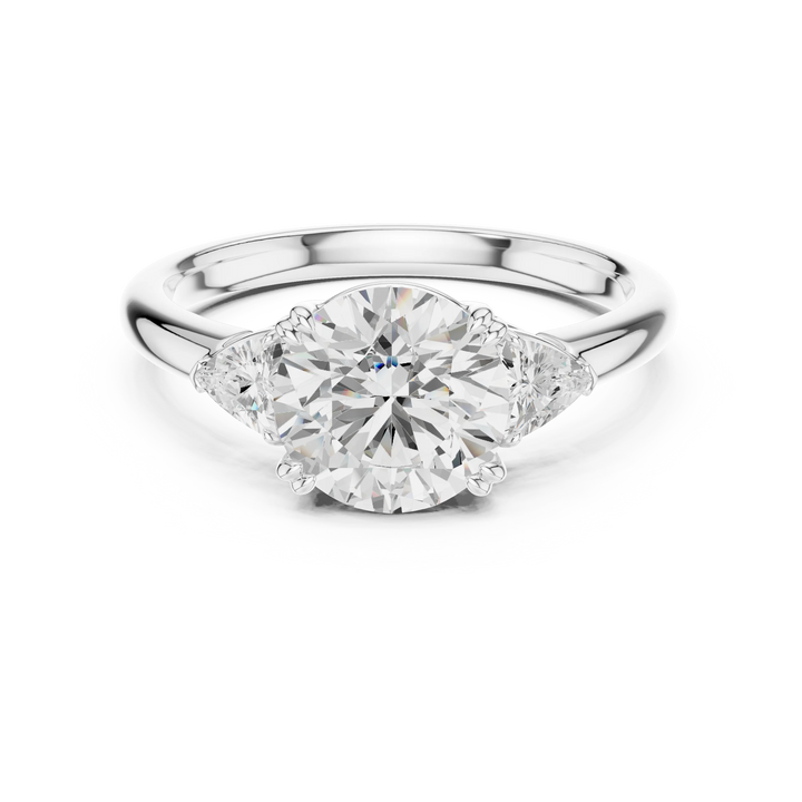 Round three-stone ring in white gold with half-moon side stones and lab-grown diamond – Australia