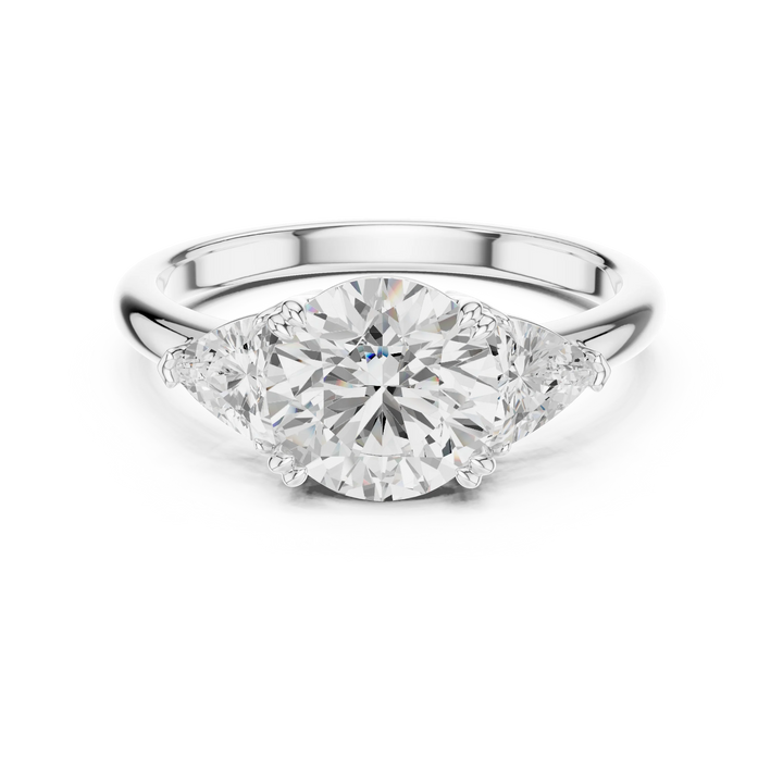 Rose gold round three-stone ring with trillion cut side stones and lab-grown diamond – Australia