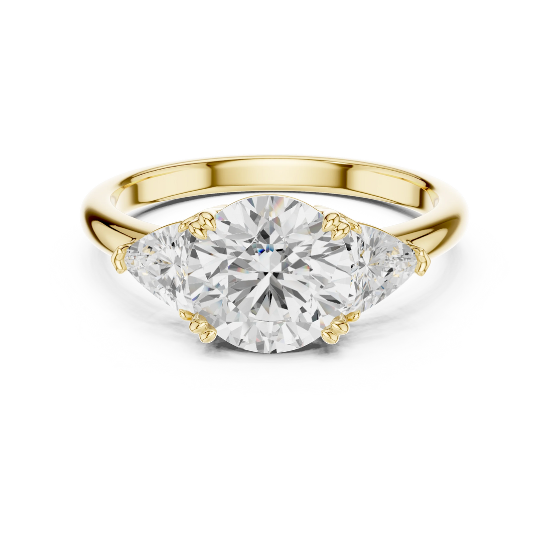 Round three-stone ring in yellow gold with trillion cut side stones and lab-grown diamond – Australia