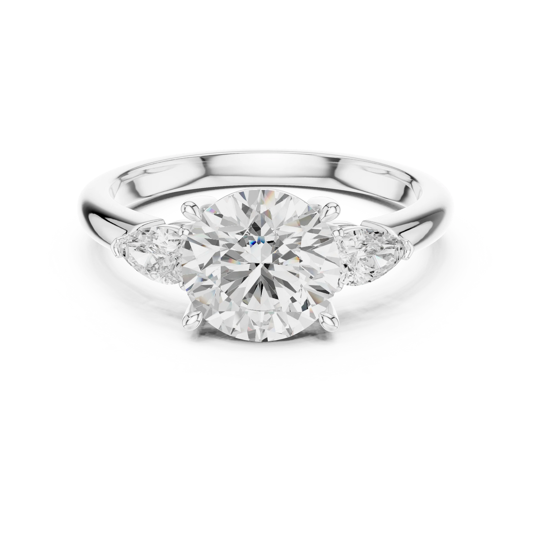 Round three-stone ring in white gold with pear side stones and lab-grown diamond – Australia