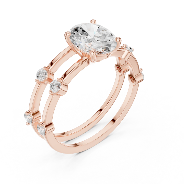 Split shank rose gold ring with center oval lab-grown diamond and side stones front view