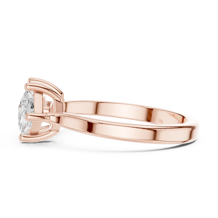 Side view of rose gold Toi et Moi ring highlighting double princess diamond setting