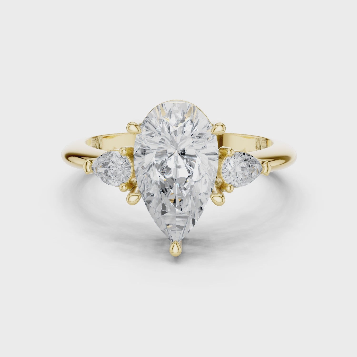 Isla Graceful Pear Diamond Three-Stone Ring