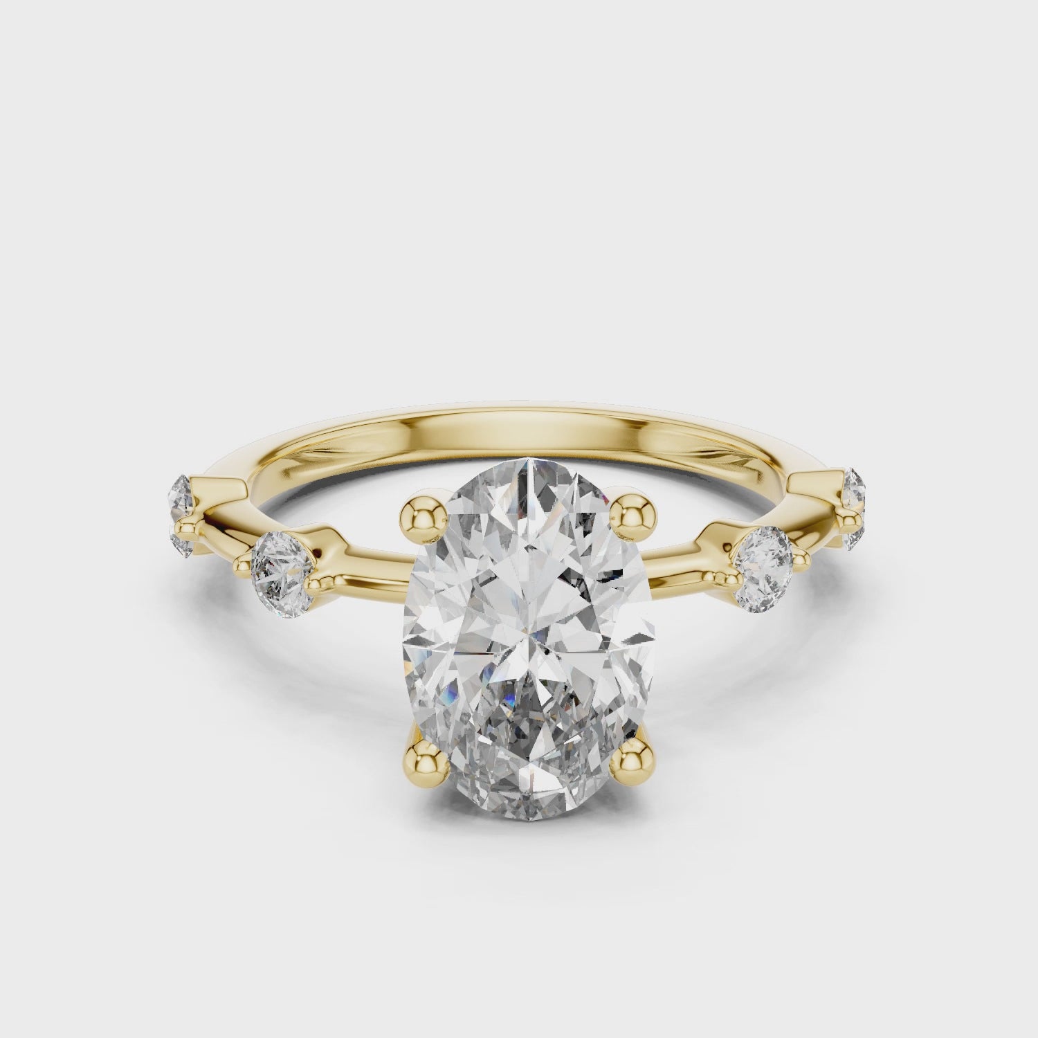 Oval Solitaire Diamond Ring with Round Side Accents