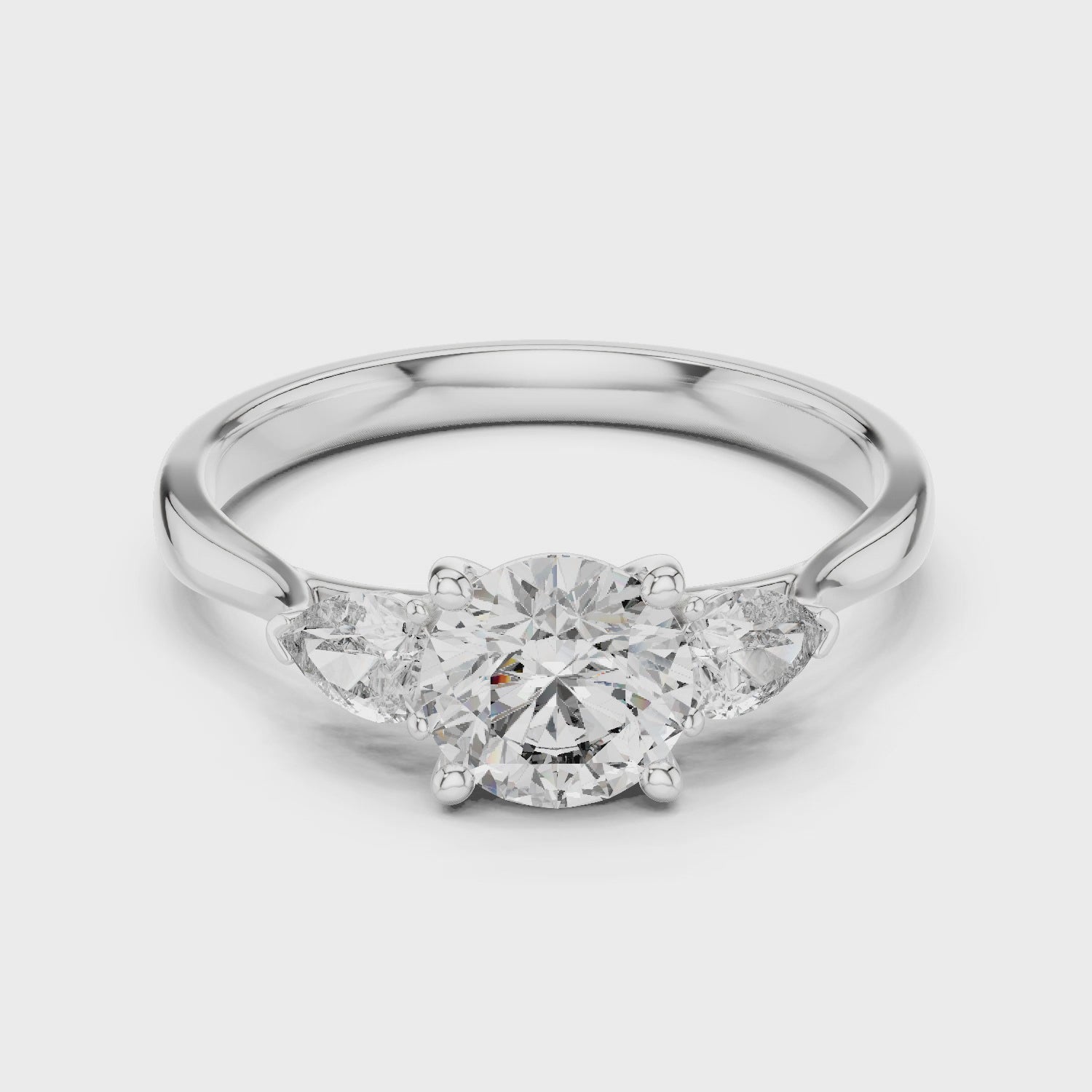 Round Three-Stone Diamond Ring