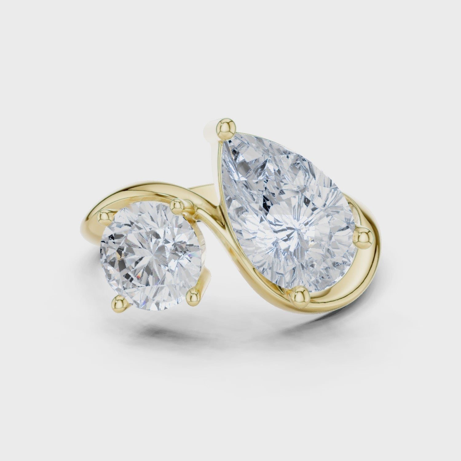 Round & Pear Diamond Bypass Ring