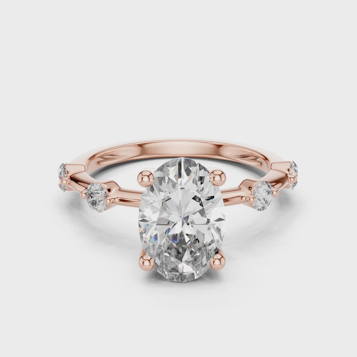 Oval Solitaire Diamond Ring with Round Side Accents