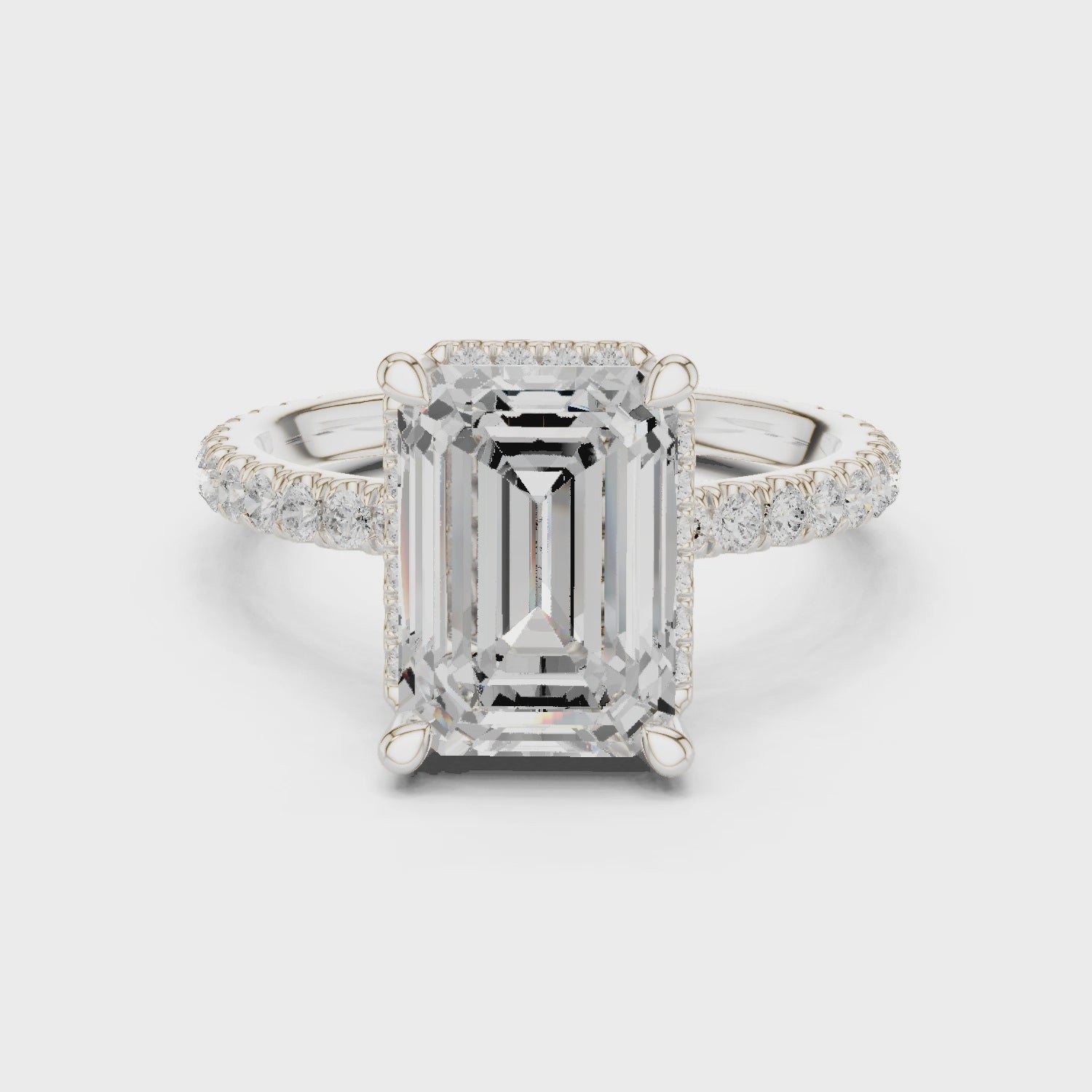 Quade Timeless Halo Emerald Diamond Ring
