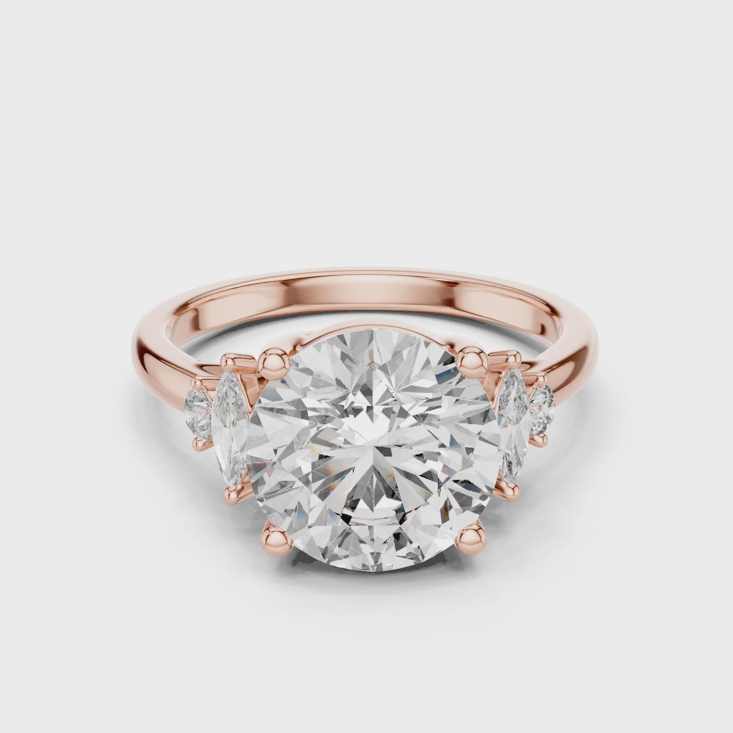 Round Solitaire Diamond Ring with Oval Side Accents
