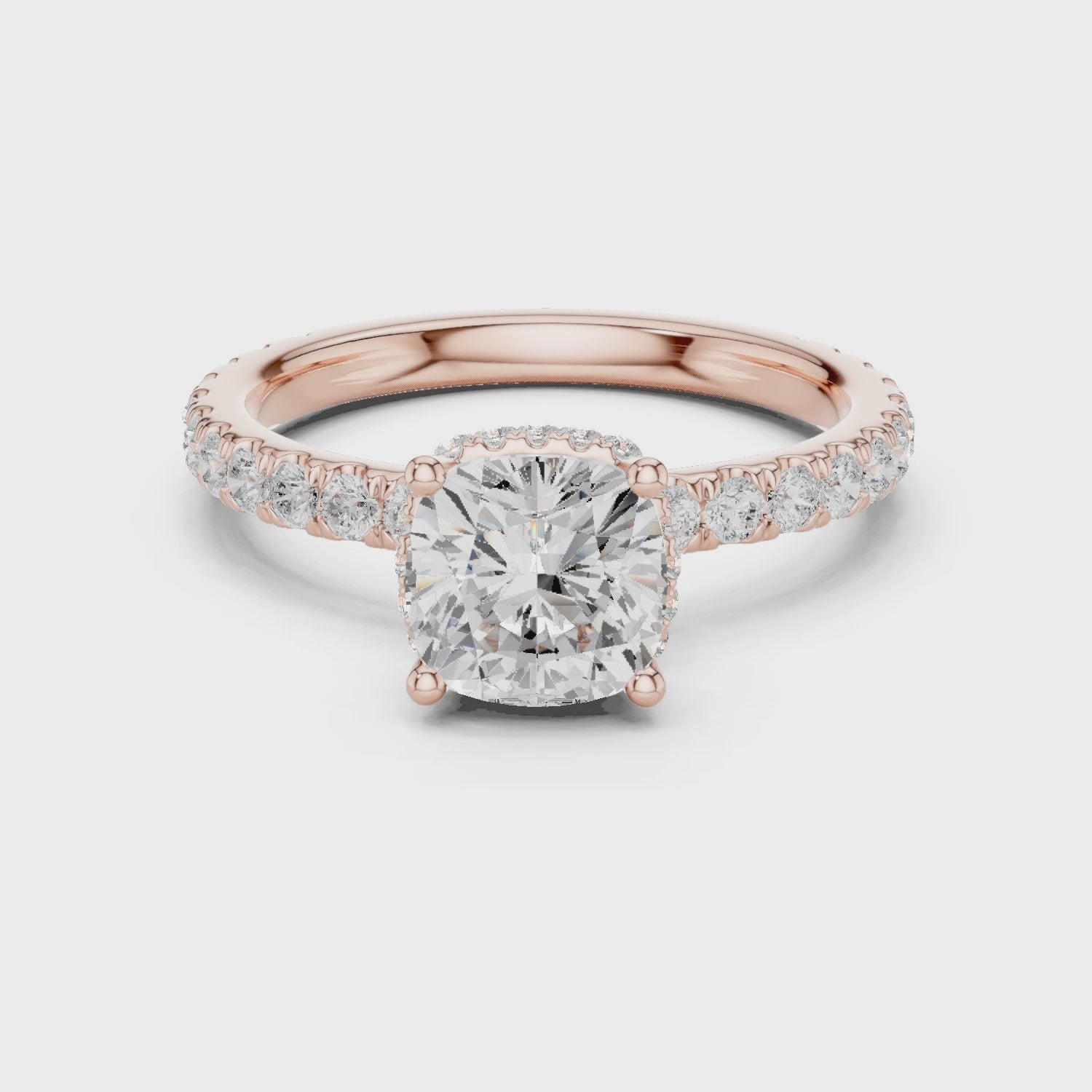  Video of cushion cut hidden halo ring with pave diamond band in rose gold
