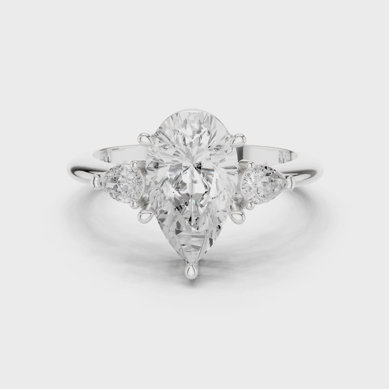 Isla Graceful Pear Diamond Three-Stone Ring