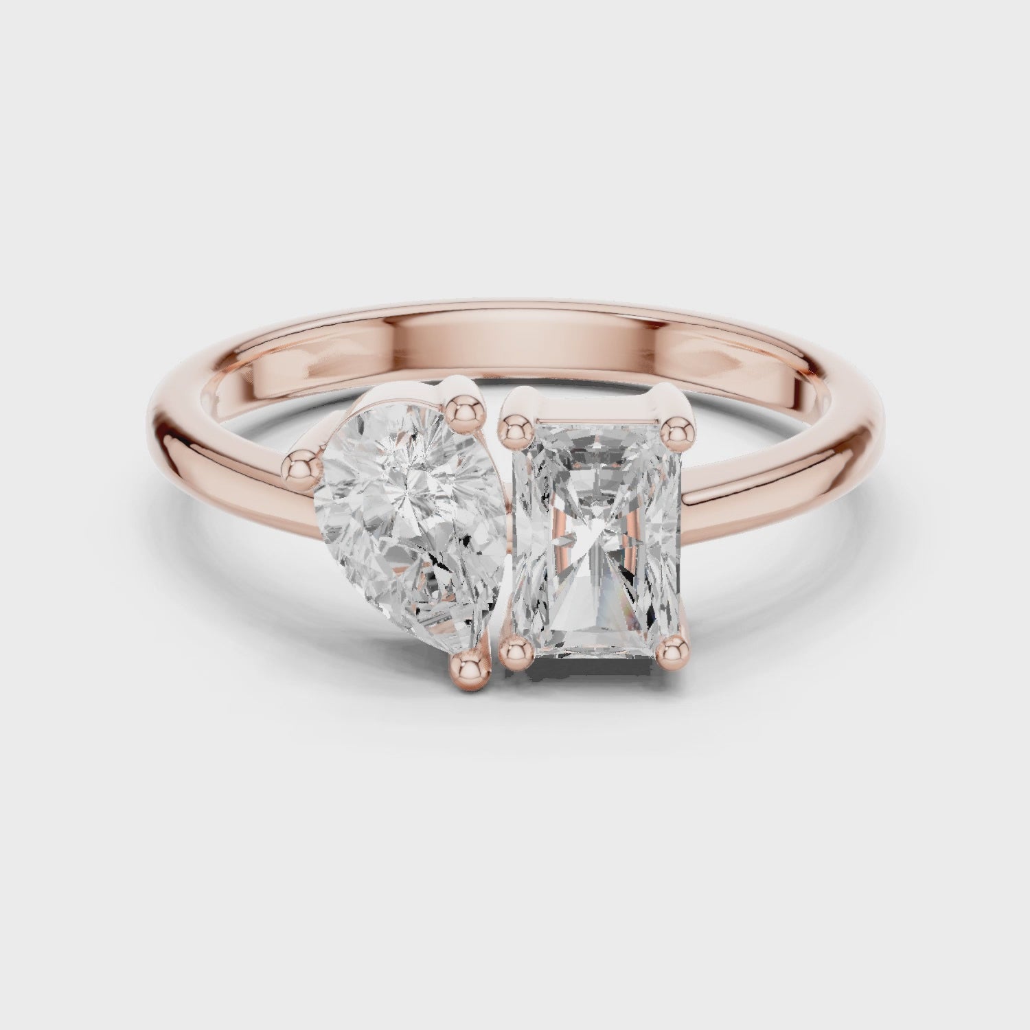 Video of rose gold Toi et Moi ring featuring pear and radiant lab-grown diamonds