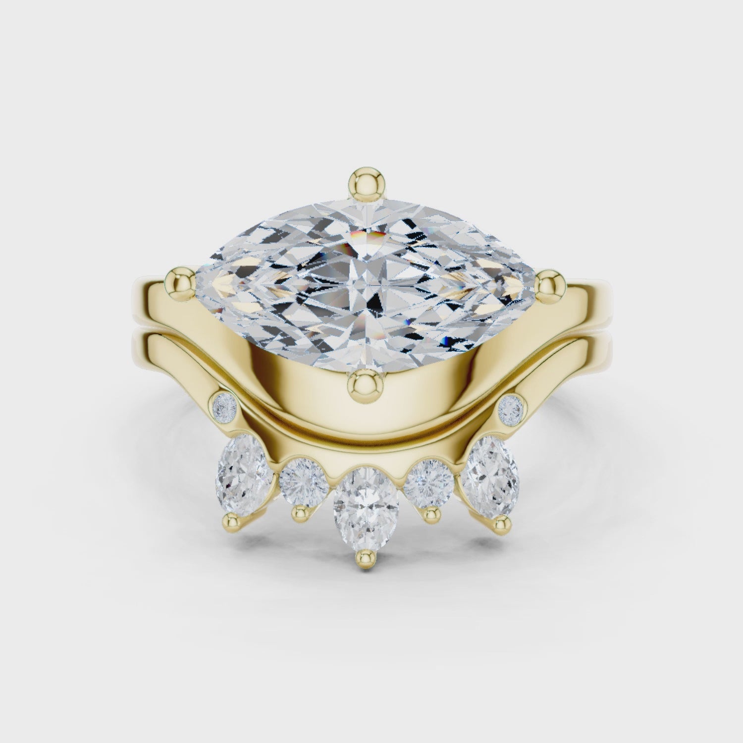 Video of yellow gold marquise solitaire ring with crown tiara band highlighting elegant structure
